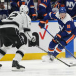 
              New York Islanders right wing Simon Holmstrom (10) skates against Los Angeles Kings defenseman Alexander Edler (2) during the second period of an NHL hockey game Friday, Feb. 24, 2023, in Elmont, N.Y. (AP Photo/Mary Altaffer)
            
