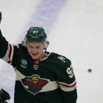 
              Minnesota Wild left wing Kirill Kaprizov celebrates after scoring the game-winning goal to defeat the Columbus Blue Jackets during overtime of an NHL hockey game, Sunday, Feb. 26, 2023, in St. Paul, Minn. (AP Photo/Abbie Parr)
            
