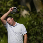 
              Sepp Straka, of Austria, wipes his face before teeing off on the third hole in the first round of the Honda Classic golf tournament, Thursday, Feb. 23, 2023, in Palm Beach Gardens, Fla. (AP Photo/Rebecca Blackwell)
            