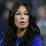 
              FILE - Buffalo Bills co-owner Kim Pegula stands on the field  before an NFL football game, in Arlington, Texas, on Nov. 28, 2019. Pro tennis player Jessica Pegula has revealed that her mother, Buffalo Bills and Sabres co-owner Kim Pegula, went into cardiac arrest in June and is "improving every day" as she deals with significant language and memory issues. (AP Photo/Michael Ainsworth, File)
            