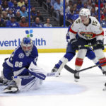 
              Florida Panthers' Anton Lundell (15) scores past Tampa Bay Lightning goaltender Andrei Vasilevskiy during the first period of an NHL hockey game Tuesday, Feb. 28, 2023, in Tampa, Fla. (AP Photo/Mike Carlson)
            