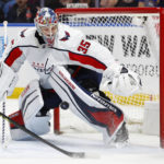 
              Washington Capitals goaltender Darcy Kuemper (35) makes a pad save during the first period of an NHL hockey game against the Buffalo Sabres, Sunday, Feb. 26, 2023, in Buffalo, N.Y. (AP Photo/Jeffrey T. Barnes)
            