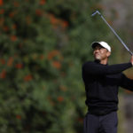 
              Tiger Woods hits from the fourth tee during the second round of the Genesis Invitational golf tournament at Riviera Country Club, Friday, Feb. 17, 2023, in the Pacific Palisades area of Los Angeles. (AP Photo/Ryan Kang)
            