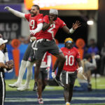 
              AFC tight end Mark Andrews (89) of the Baltimore Ravens, left, celebrates a touchdown with teammate AFC quarterback Tyler Huntley (2) of the Baltimore Ravens during the flag football event at the NFL Pro Bowl, Sunday, Feb. 5, 2023, in Las Vegas. (AP Photo/John Locher)
            