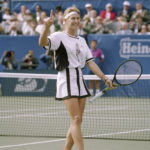 
              FILE - Steffi Graf signals the No. 1 sign after winning the women's singles championship at the U.S. Open in New York, Saturday, Sept. 11, 1993. Graf defeated Helena Skova in straight sets 6-3, 6-3. Novak Djokovic broke the record for the most time spent at No. 1 in the professional tennis rankings by a man or woman, beginning his 378th week in the ATP’s top spot on Monday, Feb. 27, 2023, to surpass Steffi Graf’s 377 leading the WTA. (AP Photo/Rusty Kennedy, File)
            