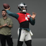 
              Philadelphia Eagles' Jalen Hurts throws a pass during practice at the NFL football team's training facility, Friday, Feb. 3, 2023, in Philadelphia. The Eagles are scheduled to play the Kansas City Chiefs in Super Bowl LVII on Sunday, Feb. 12, 2023. (AP Photo/Matt Slocum)
            