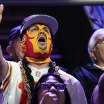 
              A Kansas City Chiefs fan cheers during the NFL football Super Bowl 57 opening night, Monday, Feb. 6, 2023, in Phoenix. The Kansas City Chiefs will play the Philadelphia Eagles on Sunday. (AP Photo/Matt York)
            