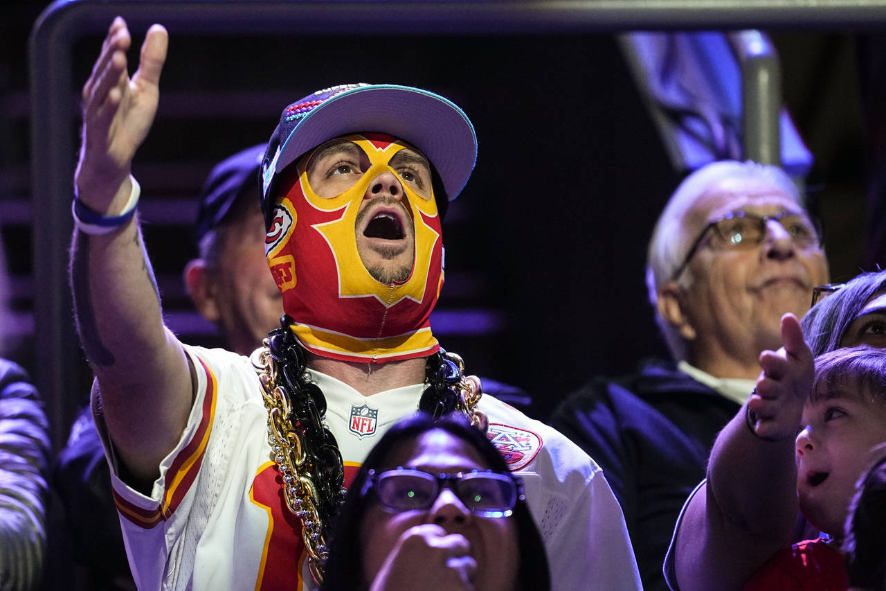 A Kansas City Chiefs fan cheers during the NFL football Super Bowl 57 opening night, Monday, Feb. 6...