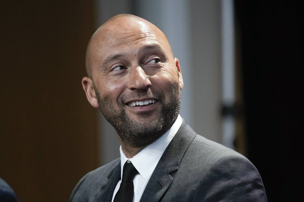 FILE - Former New York Yankees baseball player Derek Jeter attends a news conference at Yankee Stad...