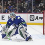 
              Vancouver Canucks goalie Arturs Silovs gives up a goal to New York Rangers' Mika Zibanejad during the first period of an NHL hockey game Wednesday, Feb. 15, 2023, in Vancouver, British Columbia. (Darryl Dyck/The Canadian Press via AP)
            