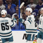 
              San Jose Sharks right wing Timo Meier (28) celebrates his goal against the Tampa Bay Lightning with defenseman Erik Karlsson (65) and center Tomas Hertl (48) during the second period of an NHL hockey game Tuesday, Feb. 7, 2023, in Tampa, Fla. (AP Photo/Chris O'Meara)
            