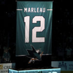 
              Former San Jose Sharks player Patrick Marleau's No. 12 is lifted up at an event where his jersey number was retired in San Jose, Calif., Saturday, Feb. 25, 2023. (AP Photo/John Hefti)
            