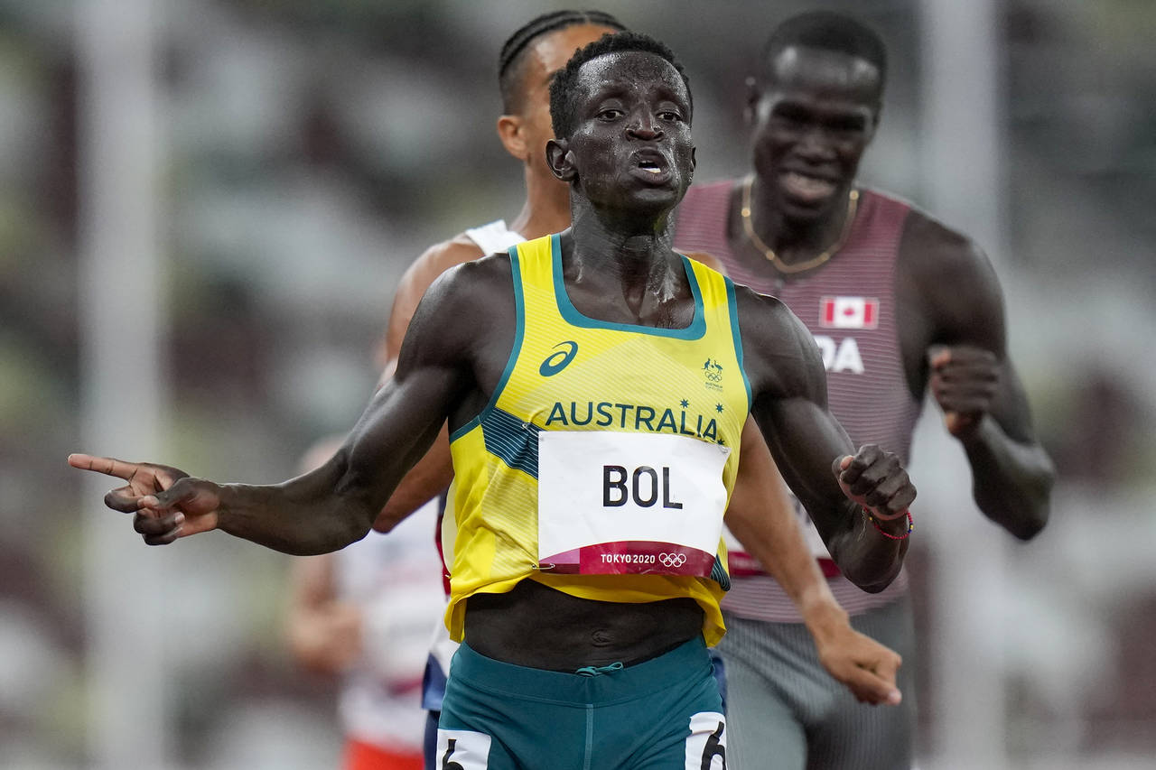 FILE - Peter Bol, of Australia, wins a men's 800-meter semifinal at the 2020 Summer Olympics, on Au...