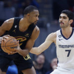 
              Cleveland Cavaliers forward Evan Mobley plays against Memphis Grizzlies forward Santi Aldama (7) during the first half of an NBA basketball game, Thursday, Feb. 2, 2023, in Cleveland. (AP Photo/Ron Schwane)
            