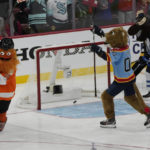 
              Hockey mascots celebrate after Stanley C. Panther scores a goal during the NHL All Star Skills Showcase, Friday, Feb. 3, 2023, in Sunrise, Fla. (AP Photo/Lynne Sladky)
            
