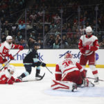 
              Seattle Kraken right wing Jordan Eberle (7) scores as Detroit Red Wings goaltender Ville Husso (35) looks for the puck during the second period of an NHL hockey game Saturday, Feb. 18, 2023, in Seattle. (AP Photo/ Lindsey Wasson)
            