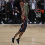 
              Jericho Sims of the New York Knicks shoots during the slam dunk competition of the NBA basketball All-Star weekend Saturday, Feb. 18, 2023, in Salt Lake City. (AP Photo/Rob Gray)
            