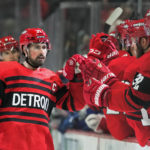 
              Detroit Red Wings center Dylan Larkin (71) celebrates his goal against the Vancouver Canucks in the first period of an NHL hockey game Saturday, Feb. 11, 2023, in Detroit. (AP Photo/Paul Sancya)
            