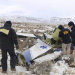 
              This photo provided by The National Transportation Safety Board shows NTSB investigators on Sunday, Feb. 26, 2023, at the crash site in Dayton, Nev., documenting the wreckage of a Pilatus PC-12 airplane a medical air transport flight operated by Guardian Flight that crashed on Friday, Feb. 24, while enroute from Reno, Nevada, to Salt Lake City. (NTSB via AP)
            