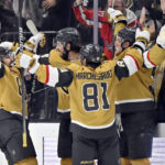
              The Vegas Golden Knights celebrate center Jack Eichel's goal against the Dallas Stars during the third period of an NHL hockey game Saturday, Feb. 25, 2023, in Las Vegas. (AP Photo/David Becker)
            