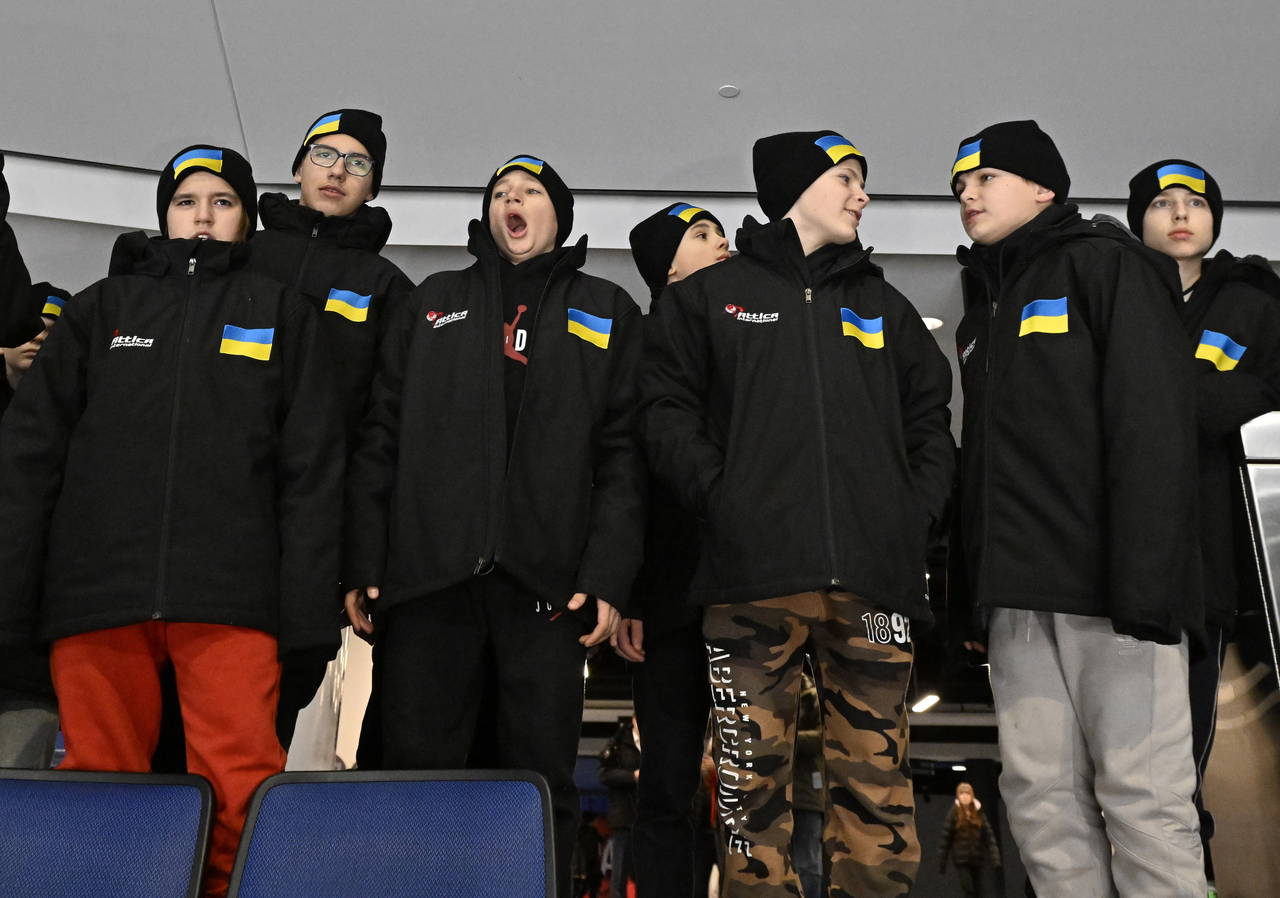 FILE -  Ukrainian peewee hockey players check out the arena as they arrive, Wednesday, Feb. 1, 2023...