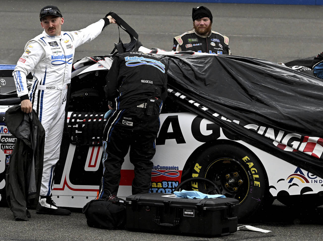 Austin Dillon stands next to his car after returning to the pits when the NASCAR Xfinity Series rac...