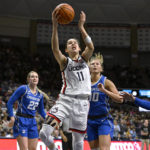 
              UConn's Lou Lopez-Senechal (11) shoots against Creighton during the second half of an NCAA college basketball game Wednesday, Feb. 15, 2023, in Storrs, Conn. (AP Photo/Jessica Hill)
            