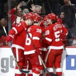 
              Detroit Red Wings right wing Filip Zadina, second from right, celebrates with teammates after scoring against the New York Rangers during the second period of an NHL hockey game Thursday, Feb. 23, 2023, in Detroit. (AP Photo/Duane Burleson)
            