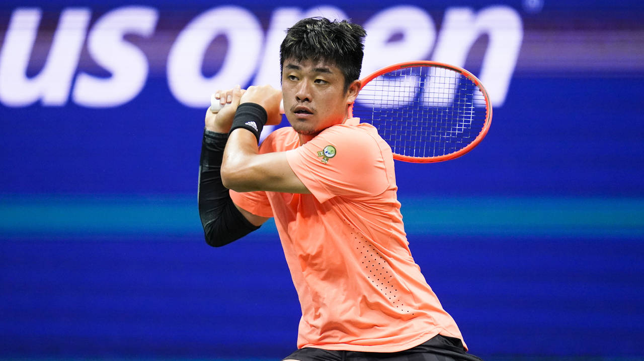 FILE - Yibing Wu, of China, returns a shot to Daniil Medvedev, of Russia, during the third round of...