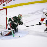 
              Florida Panthers center Anton Lundell (15) scores a goal against Minnesota Wild goalie Filip Gustavsson (32) in a shootout of an NHL hockey game Monday, Feb. 13, 2023, in St. Paul, Minn. (AP Photo/Craig Lassig)
            