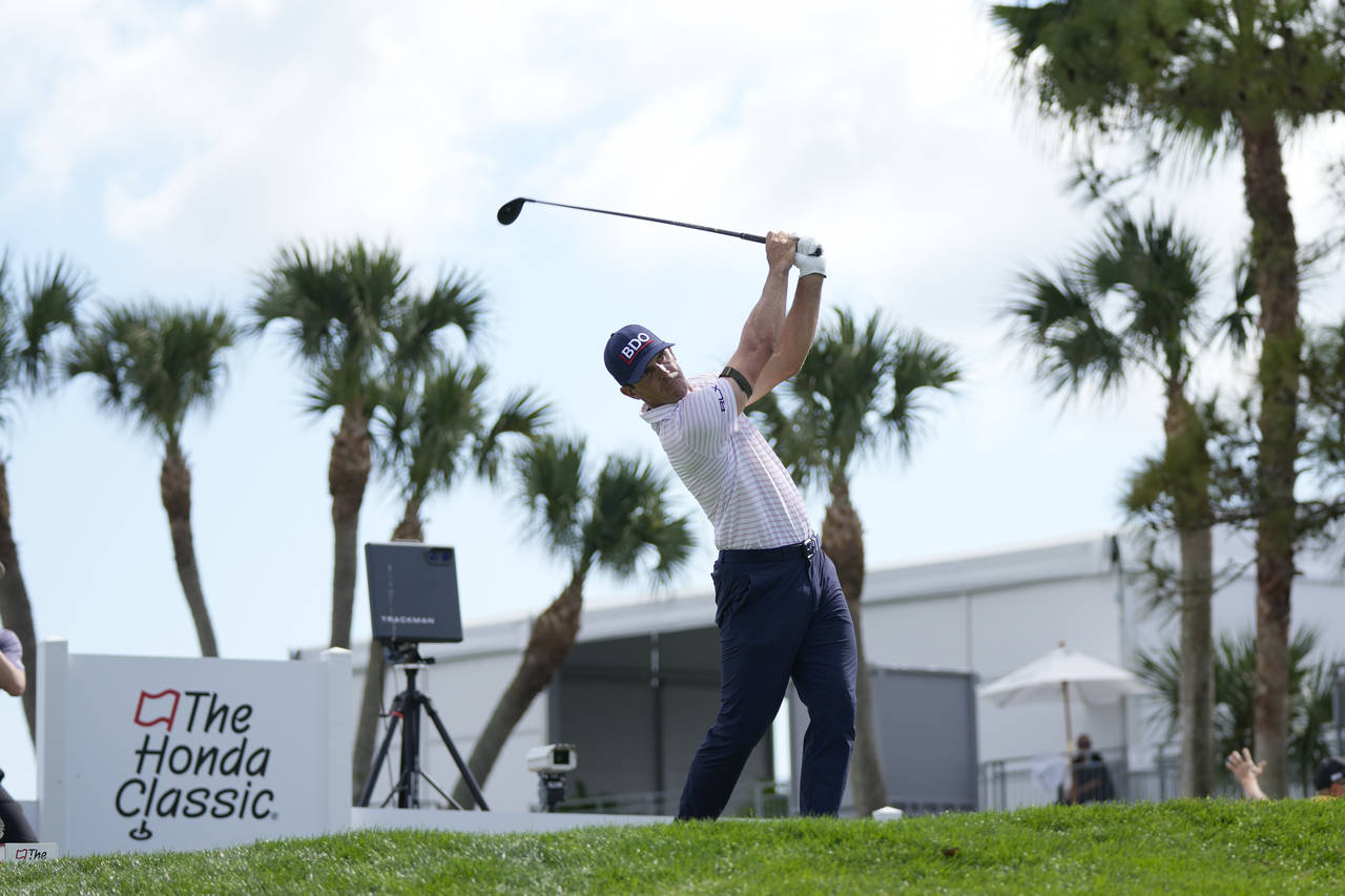 Billy Horschel tees off on the fourth hole in the first round of the Honda Classic golf tournament,...