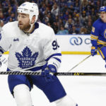 
              Toronto Maple Leafs center Ryan O'Reilly (90) skates during the second period of the team's NHL hockey game against the Toronto Maple Leafs, Tuesday, Feb. 21, 2023, in Buffalo, N.Y. (AP Photo/Jeffrey T. Barnes)
            