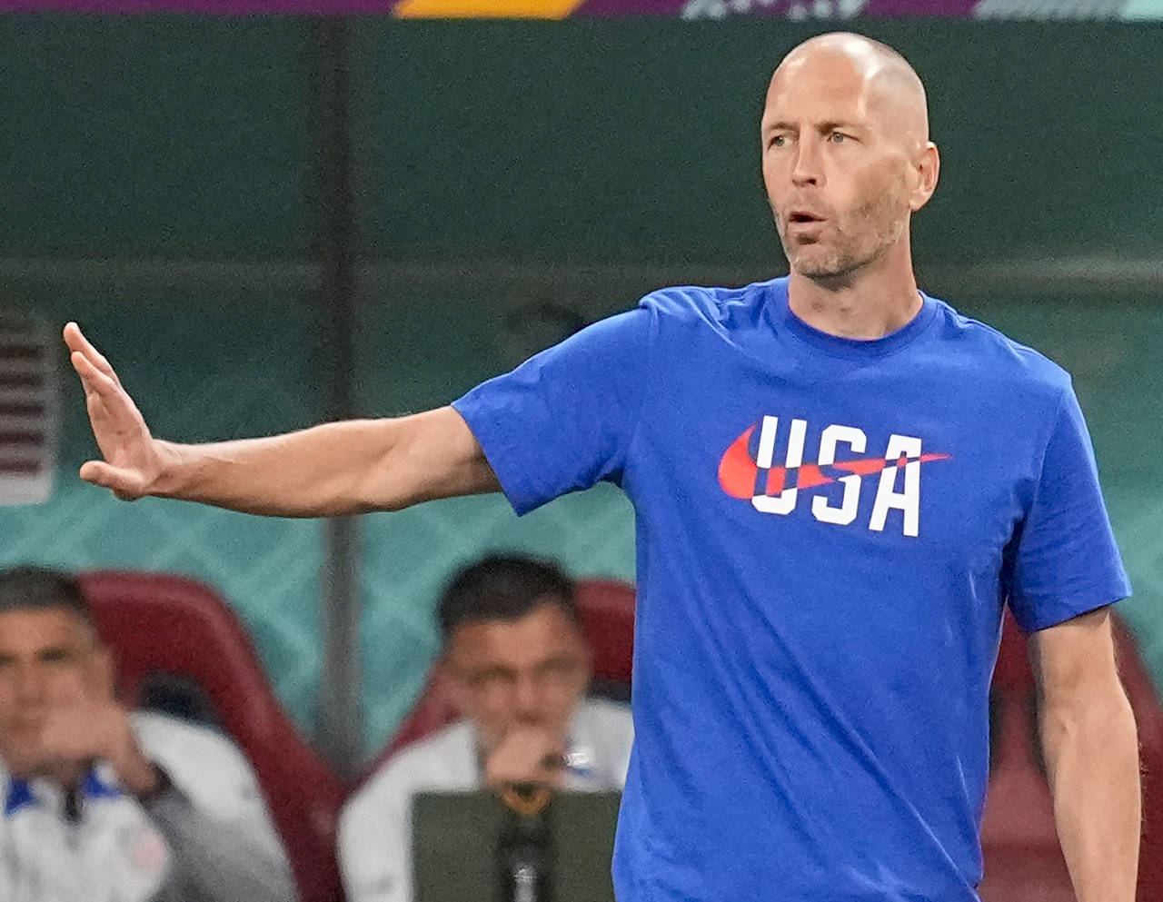 FILE - United States head coach Gregg Berhalter gestures during the World Cup round of 16 soccer ma...