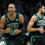
              Boston Celtics' Al Horford (42) reacts beside Derrick White after missing a shot during the second half of an NBA basketball game against the Phoenix Suns, Friday, Feb. 3, 2023, in Boston. (AP Photo/Michael Dwyer)
            