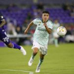 
              FILE - Atlanta United's Thiago Almada, right, gets position on a pass in front of Orlando City's Antonio Carlos (25) during the first half of an MLS soccer match Wednesday, Sept. 14, 2022, in Orlando, Fla. The 21-year-old will step into a larger role this season for Atlanta United following the departure of Martinez to Miami. Almada appeared in 29 games and had six goals and seven assists last season. Atlanta will be hoping that Almada can quickly develop a relationship with new forward Giorgos Giakoumakis, who just arrived from Celtic. (AP Photo/John Raoux, File)
            