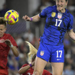 
              U.S. midfielder Andi Sullivan (17) and Canada midfielder Quinn compete for a head ball; during the second half of a SheBelieves Cup soccer match Thursday, Feb. 16, 2023, in Orlando, Fla. (AP Photo/Phelan M. Ebenhack)
            