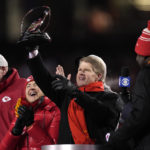 
              Kansas City Chiefs owner Clark Hunt holds the Lamar Hunt Trophy after the NFL AFC Championship playoff football game against the Cincinnati Bengals, Sunday, Jan. 29, 2023, in Kansas City, Mo. The Chiefs won 23-20. (AP Photo/Jeff Roberson)
            