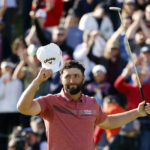 
              Jon Rahm celebrates on the 18th green after winning the Genesis Invitational golf tournament at Riviera Country Club, Sunday, Feb. 19, 2023, in the Pacific Palisades area of Los Angeles. (AP Photo/Ryan Kang)
            