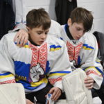 
              Ukraine hockey goalie Dmytro Korzh, left, and Maksym Kukharenko react after losing their match against Vermont Flames Academy at the International Peewee Tournament in Quebec City, Friday, Feb. 17, 2023.  (Jacques Boissinot/The Canadian Press via AP)
            