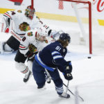 
              Winnipeg Jets' Kyle Connor's (81) backhander goes off the post during the second period of the team's NHL hockey game against the Chicago Blackhawks on Saturday, Feb. 11, 2023, in Winnipeg, Manitoba. (John Woods/The Canadian Press via AP)
            