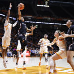 
              South Carolina guard Zia Cooke (1) shoots past Tennessee forward Rickea Jackson (2) during the second half of an NCAA college basketball game, Thursday, Feb. 23, 2023, in Knoxville, Tenn. (AP Photo/Wade Payne)
            