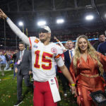 
              Kansas City Chiefs quarterback Patrick Mahomes (15) leaves the field with his wife, Brittany, after the NFL Super Bowl 57 football game, Sunday, Feb. 12, 2023, in Glendale, Ariz. The Chiefs defeated the Philadelphia Eagles 38-35. (AP Photo/Matt Slocum)
            