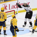
              Arizona Coyotes center Nick Bjugstad (17) celebrates after a goal by teammate Lawson Crouse (not shown) during the third period of an NHL hockey game against the Nashville Predators, Monday, Feb. 13, 2023, in Nashville, Tenn. (AP Photo/Mark Zaleski)
            