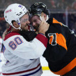 
              Montreal Canadiens' Alex Belzile, left, and Philadelphia Flyers' Wade Allison fight during the second period of an NHL hockey game, Friday, Feb. 24, 2023, in Philadelphia. (AP Photo/Matt Slocum)
            