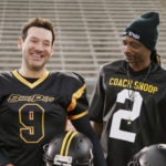 
              This photo provided by Skechers shows Tony Romo and Snoop Dogg  from a scene from Skechers 2023 Super Bowl NFL football spot. ( Skechers via AP)
            