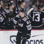 
              New Jersey Devils' Jesper Bratt (63) celebrates with teammates after scoring a goal during the first period of an NHL hockey game against the Montreal Canadiens Tuesday, Feb. 21, 2023, in Newark, N.J. (AP Photo/Frank Franklin II)
            