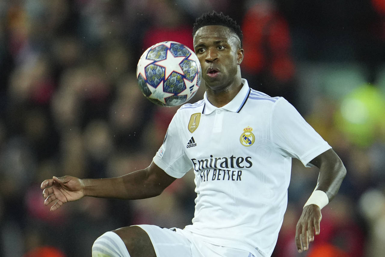 Real Madrid's Vinicius Junior controls the ball during the Champions League, round of 16, first leg...