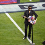 
              Recording artist Babyface performs "America the Beautiful" prior to the NFL Super Bowl 57 football game between the Kansas City Chiefs and the Philadelphia Eagles, Sunday, Feb. 12, 2023, in Glendale, Ariz. (AP Photo/Charlie Riedel)
            