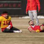 
              Kansas City Chiefs quarterback Patrick Mahomes (15) and Kansas City Chiefs tight end Travis Kelce stretch during an NFL football workout Thursday, Feb. 2, 2023, in Kansas City, Mo. The Chiefs are scheduled to play the Philadelphia Eagles in Super Bowl LVII on Sunday, Feb. 12, 2023. (AP Photo/Charlie Riedel)
            