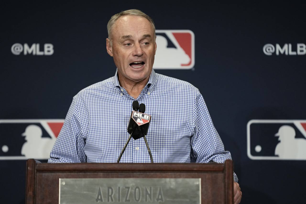 Major League Baseball Commissioner Robert Dean Manfred Jr. answers questions at spring training med...